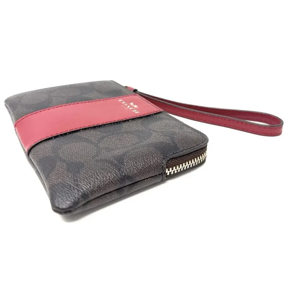 Coach Corner Zip Wristlet In Signature Canvas Brown Red